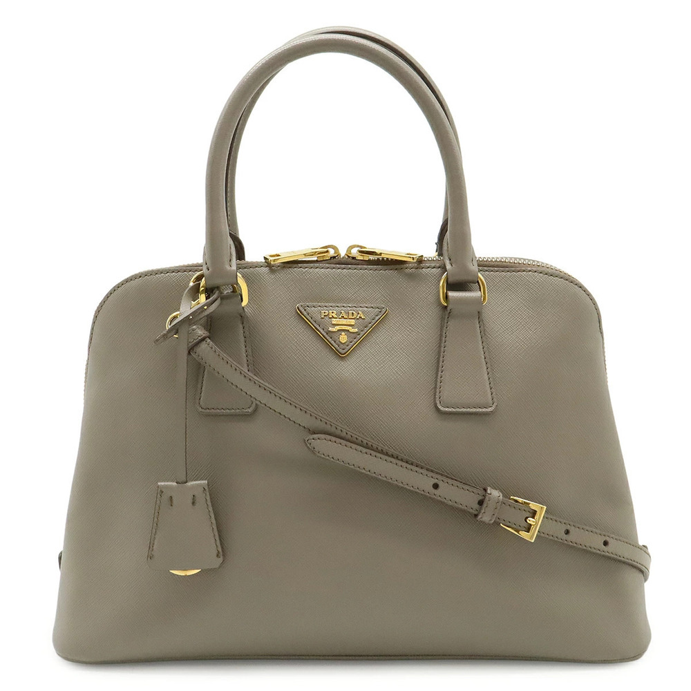 Prada Triangle Handbag Dome shaped Crossbody Bag Saffiano Leather Greige Gray